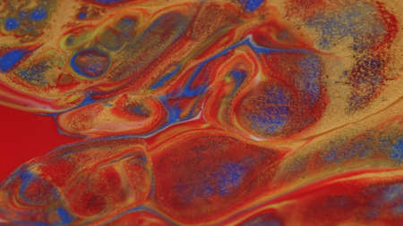 Abstract colorful background of spreading colors. Abstract red paint background.