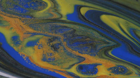 Abstract colorful background of spreading colors. Abstract dark paint background.