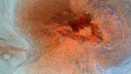 Red spots on a blue-white background. Explosion.
