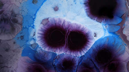 Abstract colorful background of spreading flowers. A unique screensaver picture. Background image. Acrylic paints. Alcohol ink.の写真素材