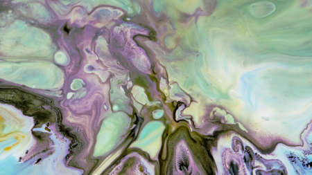Fluid paint art, marble abstractions in blue, purple, black and yellow.