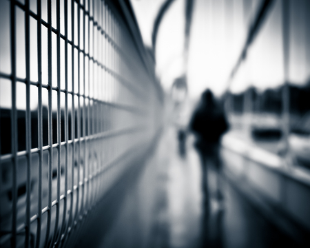 Blurred silhouette walking on Clifton Suspension Bridgeの写真素材