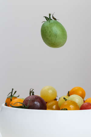 flying green tomato の写真素材