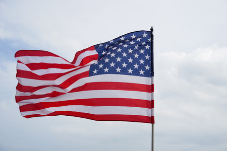 USA Flag with white background for copy space.の写真素材