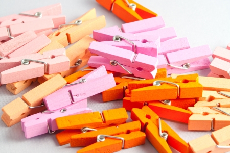 Stack of colorful wooden clothespinsの写真素材