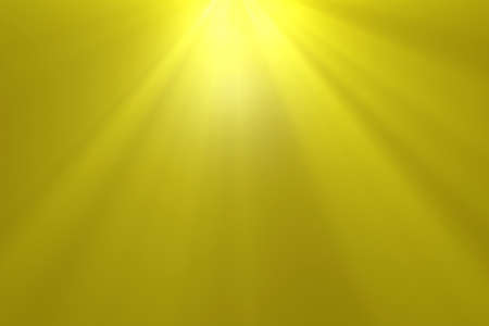 Rays of gold lights from the sky on the yellow background.の写真素材