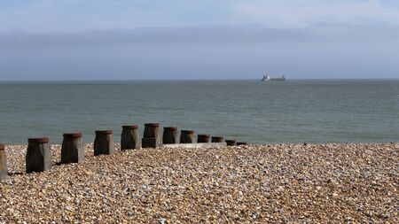 Groyne and beach near Eastbourne, East Sussex, England, United Kingdomの写真素材