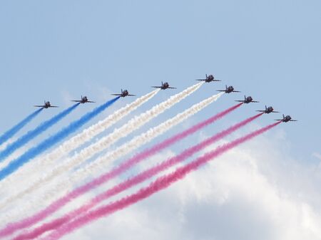 RAF Red Arrows in BAE Hawk T1 trainers, Farnborough International Airshow, Farnborough Airport, Rushmoor, Hampshire, Englandの写真素材