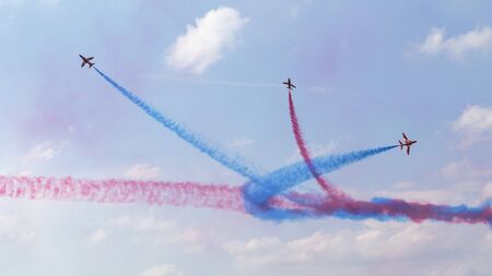 RAF Red Arrows in BAE Hawk T1 trainers, Farnborough International Airshow, Farnborough Airport, Rushmoor, Hampshire, Englandの写真素材