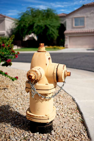 Old yellow fire hydrantの写真素材