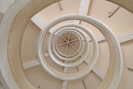 An upward spiral shot of winding stairs