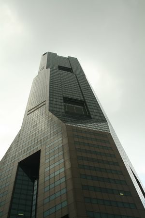 A grim looking corporate building foreshadowing trouble