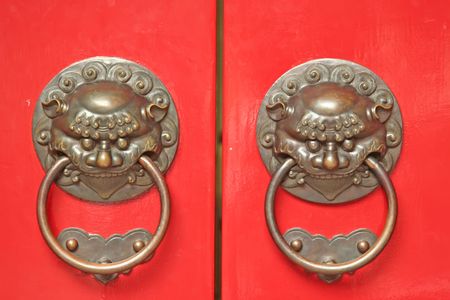 Chinese Door way with Handles and Gargoylesの写真素材