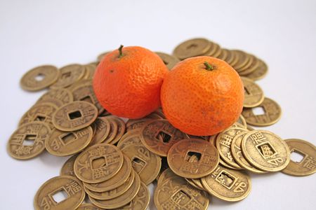 Popular chinese symbols of wealth: mandarins and coins