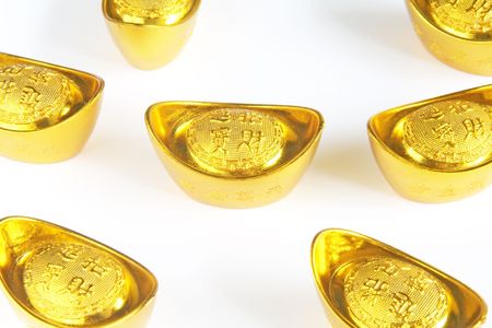 Strengthening Chinese Yuan Symbolized Through Gold Ingotsの写真素材