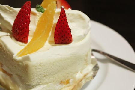 White Sponge Cream Cake in a Restaurantの写真素材
