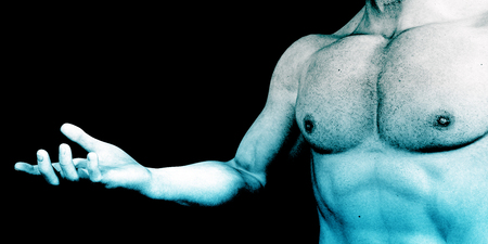 Muscular Torso of a Man on Black as Fitness Conceptの写真素材