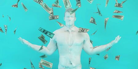 Successful Business Man with Money Dropping From the Topの写真素材