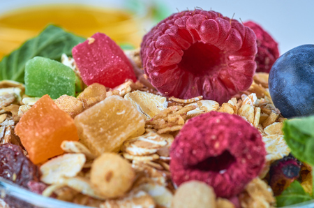 Healthy breakfast with muesli, milk, yogurt various fruits