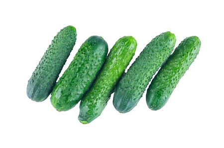 Cucumbers isolated on white background. The view from the top. Background of organic food.の写真素材