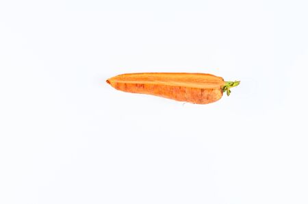 Sliced carrots on white background, top view. Background of organic food.の写真素材