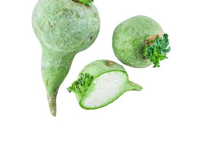 Sliced green radish isolated on white background. The view from the top. Background of organic food.の写真素材