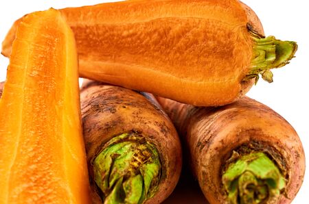 Sliced carrots on white background. Background of organic food.