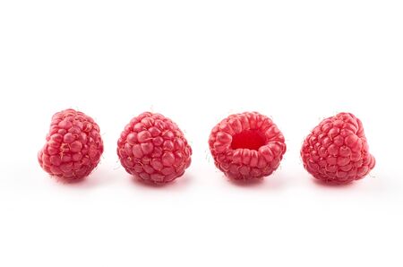 Collection of ripe red raspberries on white background.の写真素材