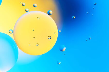 Colorful abstract images of oil drops on water. Colored circles and waves as a concept of scientific...
