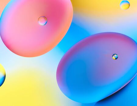 Colorful abstract images of oil drops on water. Colored circles and waves as a concept of scientific...