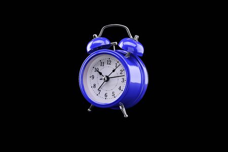Blue alarm clock close-up isolated on dark background.