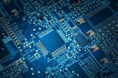 Chip on the computer's motherboard close-up. Concept of data, hardware, technician and technology.