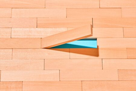 The wooden planks are staggered on a light blue in the center of an empty space for Your text....