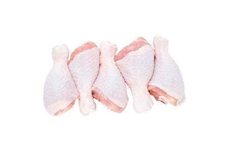 Set of five fresh chicken drumsticks isolated on a white background. The view from the top.の写真素材