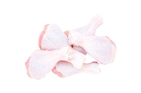 Set of five fresh chicken drumsticks isolated on a white background. The view from the top.の写真素材