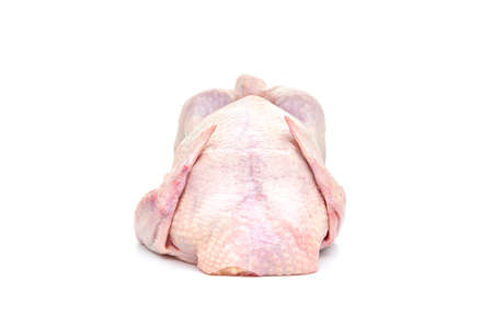 Fresh raw chicken carcass on a white background. Close up.の写真素材