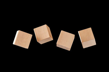 Four cubes floating in the air isolated on a black background, layout for Your design. New year's...