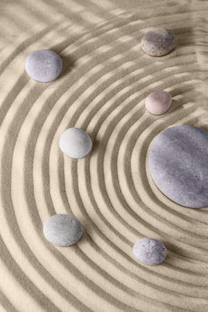 Circles on the sand and round stones in the rock garden, for relaxation and spiritual harmony. Zen...