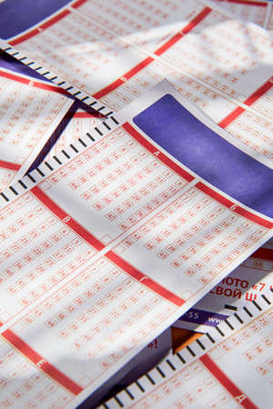 Empty lottery tickets close up, playing lottery or bingo has a chance to win the jackpot. Free space for text.の写真素材