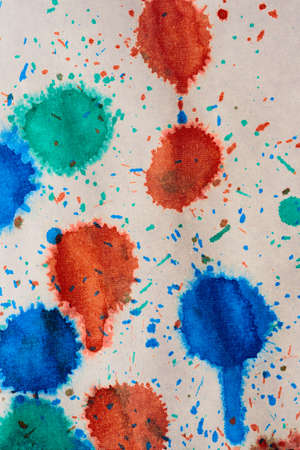 Abstract background with acrylic paint on canvas, grunge background with space for text or image, spots of watercolor paint, colorful bright texture.の写真素材