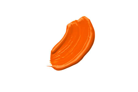 Orange acrylic paint brush stroke isolated on a white background. Watercolor or oil orange brushstroke on a white background.の写真素材