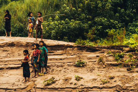Tribal kids of the Mekong river in Laosのeditorial素材