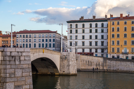 The river SaÃ´ne and one of its bridges in the city center of Lyonのeditorial素材
