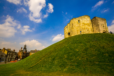 Old english castle on a grassy hillのeditorial素材