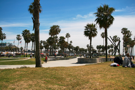 SANTA MONICA, LOS ANGELES - APRIL 9th 2014: Daytime view of the Venice Beach in Santa Monica - a part of Los Angeles. Venice Beach is popular by domestic residents for relaxing.のeditorial素材