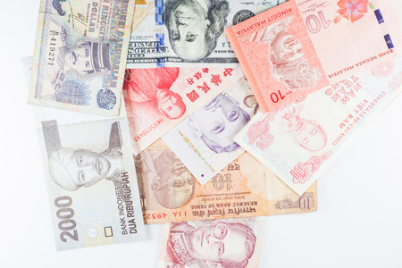 Multiple Currencies banknotes as colorful background showed the global money financial business...