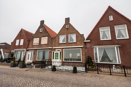 Holiday in Holland - Cold raining wet winter in Volendamのeditorial素材