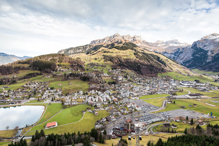 Holiday in Switzerland - Beautiful foggy view of winter landscape view of Engelberg from Mount Titlis Switzerlandの写真素材