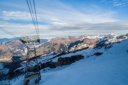 Holiday in Switzerland - Beautiful foggy view of winter landscape view of Engelberg from Mount Titlis Switzerlandの写真素材