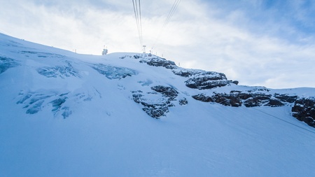 Holiday in Switzerland - Beautiful foggy view of winter landscape view of Engelberg from Mount Titlis Switzerlandの写真素材